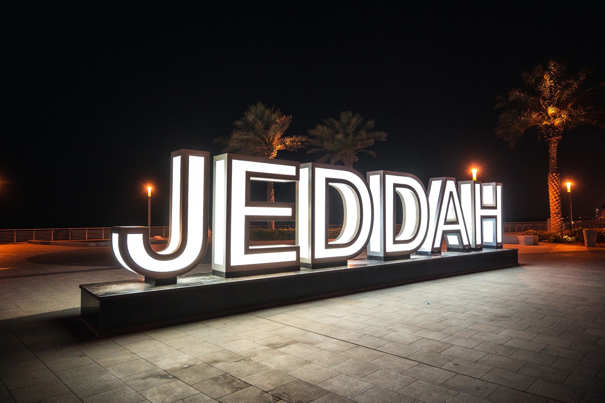 Large illuminated sign representing event signage and custom display pieces